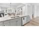 Modern kitchen area with a view of the living and entry areas in this home at 3 Derrick Ave, Hampton, GA 30228
