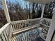 Private balcony overlooking wooded area with seating for two at 1345 Keys Crossing Ne Dr # 1345, Atlanta, GA 30319