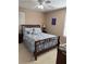 Bedroom with a queen-size bed and window with plantation shutters at 1345 Keys Crossing Ne Dr # 1345, Atlanta, GA 30319