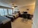 Spacious bedroom with a large bed, a home office setup, and plenty of natural light at 1345 Keys Crossing Ne Dr # 1345, Atlanta, GA 30319
