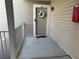 Condo entry with wreath, doormat and neutral color scheme at 1345 Keys Crossing Ne Dr # 1345, Atlanta, GA 30319