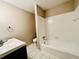 Clean bathroom with shower/tub combo and updated vanity at 61 Sandalwood Cir, Lawrenceville, GA 30046