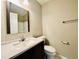 Bathroom with shower, vanity, and toilet at 61 Sandalwood Cir, Lawrenceville, GA 30046