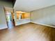 Bright living room with hardwood floors and view into dining area at 61 Sandalwood Cir, Lawrenceville, GA 30046