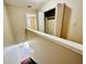 Upstairs hallway with linen closet and access to bedrooms at 61 Sandalwood Cir, Lawrenceville, GA 30046