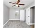 Bedroom featuring a plush carpet, a window with natural light, and neutral paint at 2222 Mcafee Rd, Decatur, GA 30032