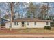 Charming single-story home featuring a welcoming front porch and well-maintained lawn at 2222 Mcafee Rd, Decatur, GA 30032