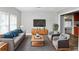 Inviting living room featuring a comfortable couch, armchairs, and modern decor at 2222 Mcafee Rd, Decatur, GA 30032