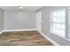 Living room features hardwood floors, natural light and neutral paint at 2222 Mcafee Rd, Decatur, GA 30032