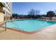 Inviting outdoor swimming pool with brick coping at 2479 Peachtree Rd # 210, Atlanta, GA 30305