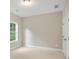 Well-lit bedroom with neutral decor and carpet flooring at 2610 Lisa Sw Dr, Atlanta, GA 30311