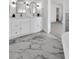 Stylish bathroom features dual sinks with marble countertops and modern lighting at 2645 Shadow Woods Ne Cir, Marietta, GA 30062