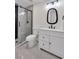 Modern bathroom with white vanity and glass shower at 2645 Shadow Woods Ne Cir, Marietta, GA 30062