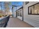 Exterior deck features stained wood and black railings, perfect for outdoor relaxation at 2645 Shadow Woods Ne Cir, Marietta, GA 30062
