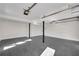 Spacious two car garage with epoxy flooring and ample room for parking and storage at 2645 Shadow Woods Ne Cir, Marietta, GA 30062