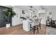 Beautiful white kitchen features modern appliances, sleek countertops, stylish island and chic finishes at 2645 Shadow Woods Ne Cir, Marietta, GA 30062