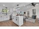 Modern kitchen offers an island, stainless steel appliances, and a seamless transition to the living area at 2645 Shadow Woods Ne Cir, Marietta, GA 30062