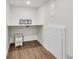 Practical laundry room features a countertop and room for storage at 2645 Shadow Woods Ne Cir, Marietta, GA 30062