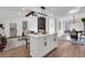 Bright and inviting living space showcases a well-equipped kitchen island, and dining area for seamless living at 2645 Shadow Woods Ne Cir, Marietta, GA 30062