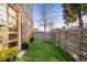 Small backyard with artificial turf and modern fence at 426 Arnold Ne St, Atlanta, GA 30308