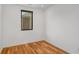 Bright bedroom with hardwood floors and a window at 426 Arnold Ne St, Atlanta, GA 30308