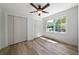 Spacious bedroom with wood-look floors and large windows at 4770 Shady Rest Dr, Powder Springs, GA 30127