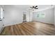 Spacious bonus room with hardwood floors and an exterior door at 4770 Shady Rest Dr, Powder Springs, GA 30127