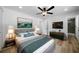 Main bedroom with hardwood floors and ensuite bathroom at 4770 Shady Rest Dr, Powder Springs, GA 30127