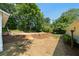 Landscaped backyard with a new pool and wooden deck at 4770 Shady Rest Dr, Powder Springs, GA 30127