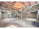 Unfinished basement with exposed pipes and unfinished walls at 1183 Cahaba Dr, Atlanta, GA 30311