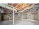 Unfinished basement with exposed pipes and unfinished walls at 1183 Cahaba Dr, Atlanta, GA 30311