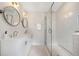 Spa-like bathroom with double vanity and glass shower at 1183 Cahaba Dr, Atlanta, GA 30311