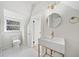 Stylish bathroom with floating vanity, gold fixtures, and hexagon tile at 1183 Cahaba Dr, Atlanta, GA 30311