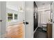 Modern bathroom with subway tile, hexagon floor tile, and updated fixtures at 1183 Cahaba Dr, Atlanta, GA 30311