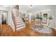 Light-filled dining area with hardwood floors and modern dining table at 1183 Cahaba Dr, Atlanta, GA 30311