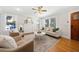 Living room with hardwood floors, fireplace, and comfortable seating arrangement at 1183 Cahaba Dr, Atlanta, GA 30311