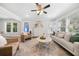 Light-filled living room features hardwood floors and a cozy seating area at 1183 Cahaba Dr, Atlanta, GA 30311