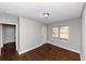 Simple bedroom with hardwood floors and neutral walls at 1368 Wichita Sw Dr, Atlanta, GA 30311