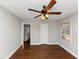 Well-lit bedroom featuring hardwood floors and ceiling fan at 1368 Wichita Sw Dr, Atlanta, GA 30311