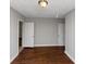 Bedroom with hardwood floors and neutral walls at 1368 Wichita Sw Dr, Atlanta, GA 30311