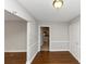 Hardwood floor dining room with access to the kitchen at 1368 Wichita Sw Dr, Atlanta, GA 30311