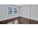 Spacious bedroom with hardwood floors and ample natural light at 1641 Pinehurst Sw Dr, Atlanta, GA 30311