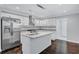 Stainless steel appliances and white cabinetry in this updated kitchen at 1641 Pinehurst Sw Dr, Atlanta, GA 30311