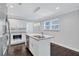 Modern kitchen island with granite countertop and double sink at 1641 Pinehurst Sw Dr, Atlanta, GA 30311