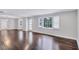 Hardwood floors and neutral walls in this open living area at 1641 Pinehurst Sw Dr, Atlanta, GA 30311