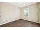 Simple bedroom with neutral walls and carpet at 2916 Hillside Pl, Decatur, GA 30034