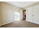 Well-lit bedroom with double doors to closet at 2916 Hillside Pl, Decatur, GA 30034