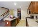 Galley kitchen with island and stainless steel appliances at 2916 Hillside Pl, Decatur, GA 30034