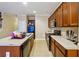 Efficient galley kitchen with island and ample counter space at 2916 Hillside Pl, Decatur, GA 30034