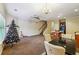 Living room with fireplace, Christmas tree and staircase at 2916 Hillside Pl, Decatur, GA 30034